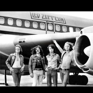 LED ZEPPELIN 8X10 FRAMED PHOTO CLASSIC  1973 IN FRONT OF PLANE